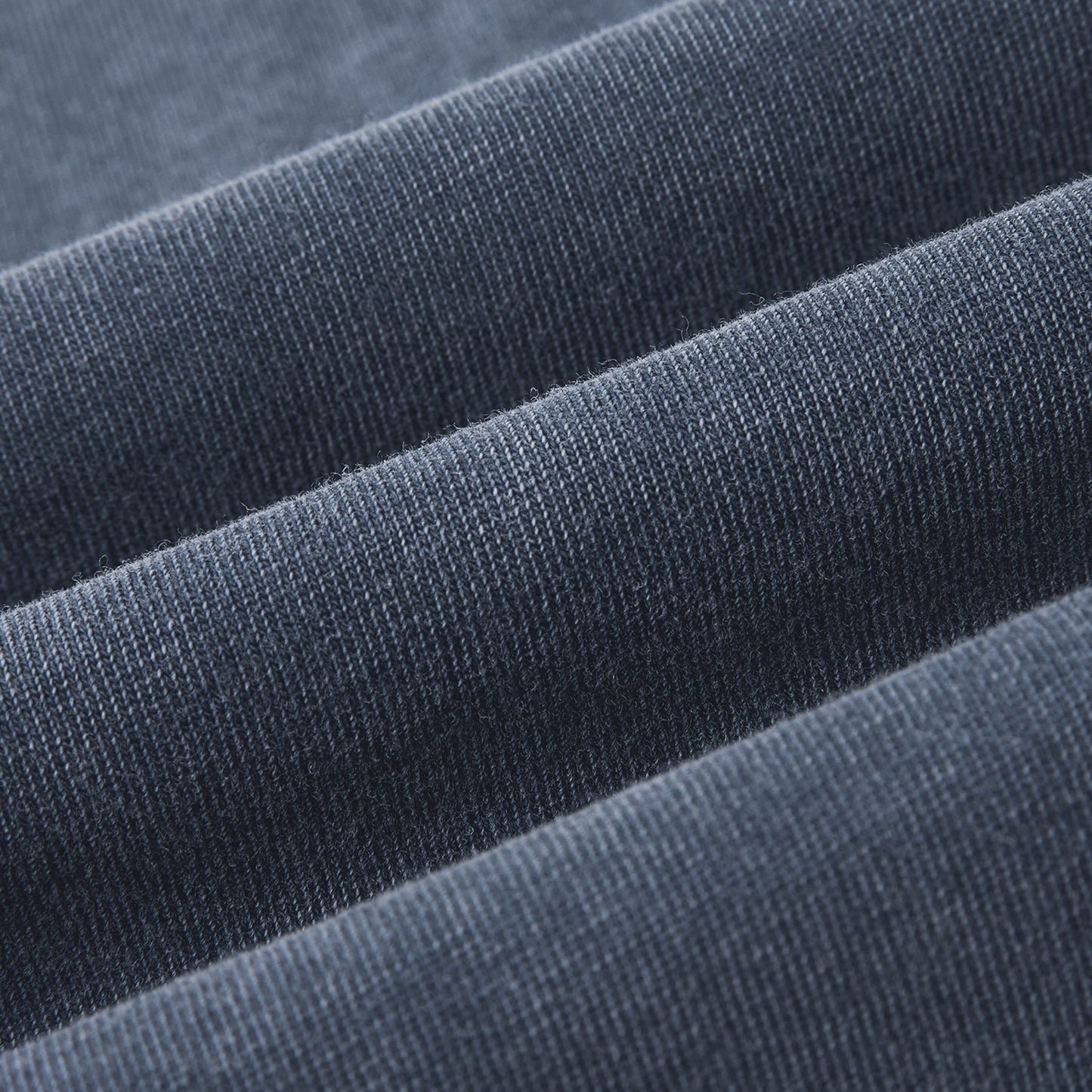 Close-up of blue fabric with a textured pattern