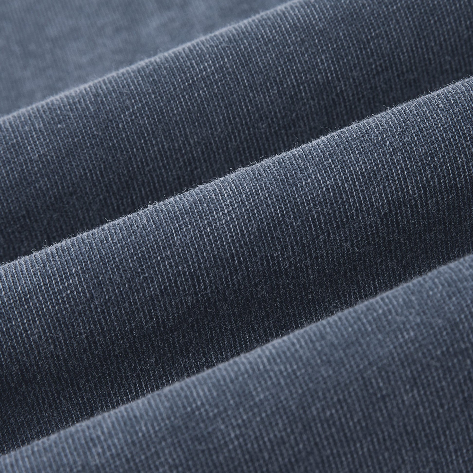 Close-up of blue fabric with a textured pattern